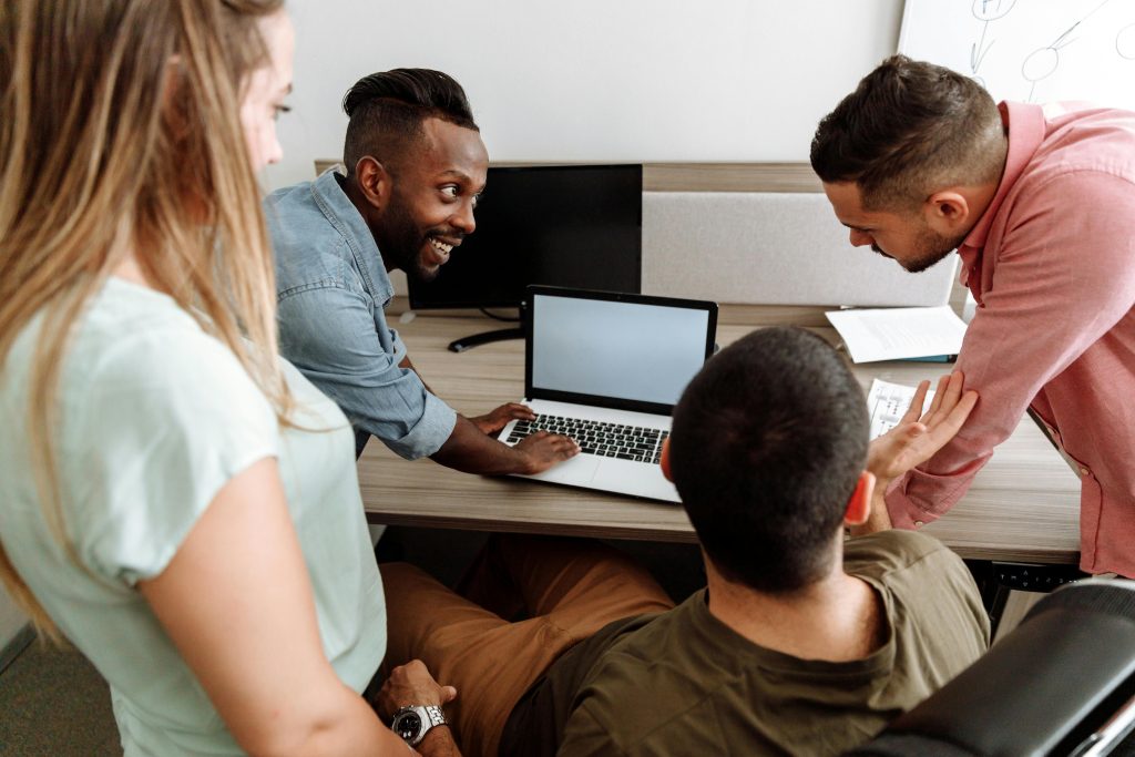 Four colleagues brainstorming